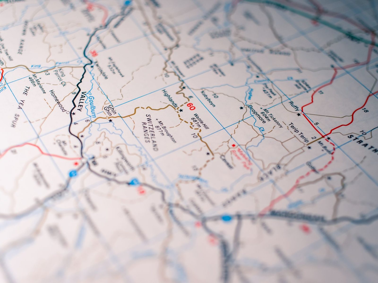 Close-up of a detailed road map highlighting highways and routes.