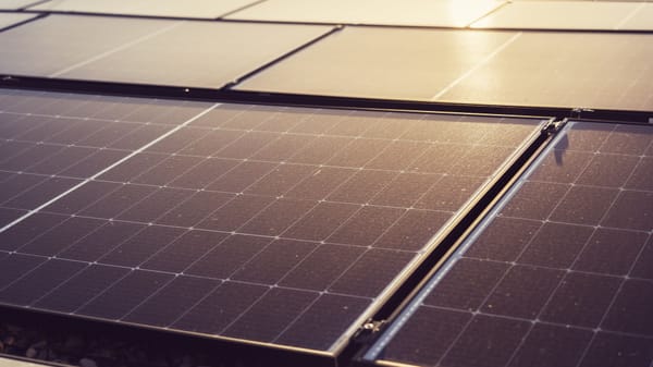 Detailed view of solar panels capturing sunlight, highlighting renewable energy technology.
