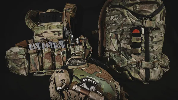 Comprehensive display of equipped tactical military gear, ready for operations.