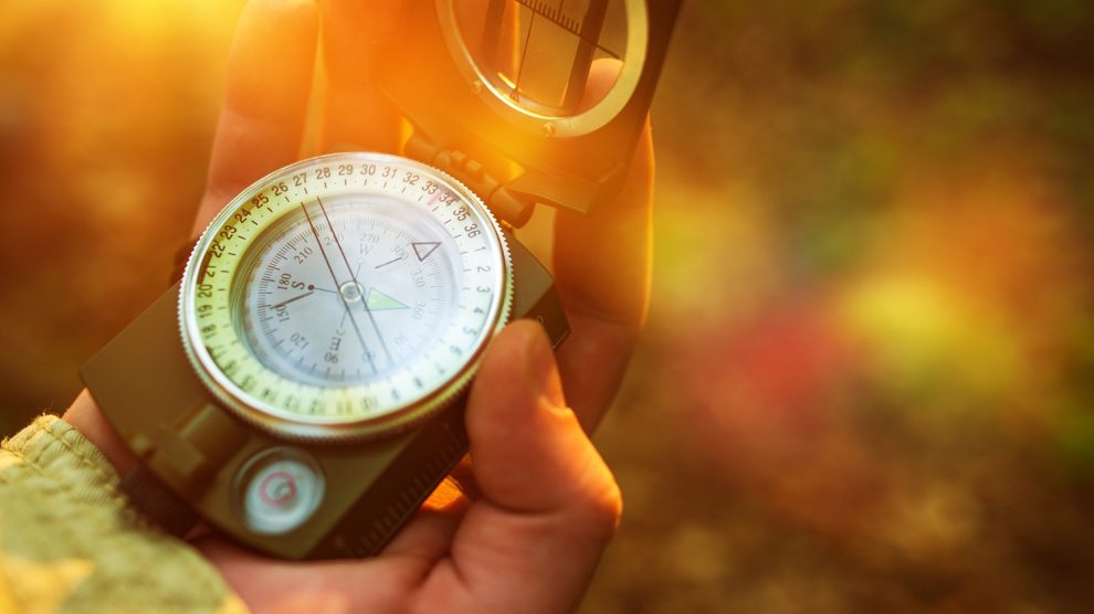 preppers using compass