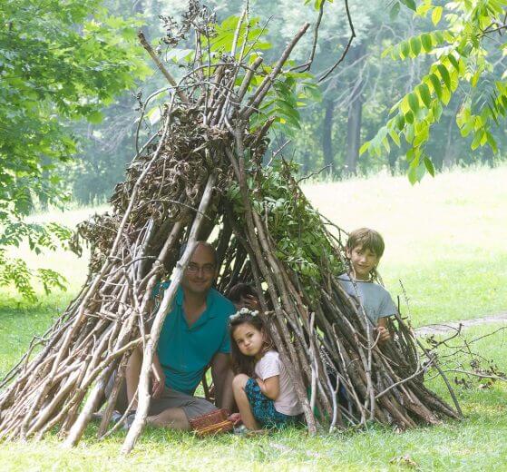 turn backyard camping trip into a survival course for the kids